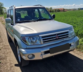 Обява за продажба на Mitsubishi Pajero pinin 1.8  Mpi 4X4 ГАЗ. ИНЖ. КЛИМА ~3 999 лв. - изображение 1