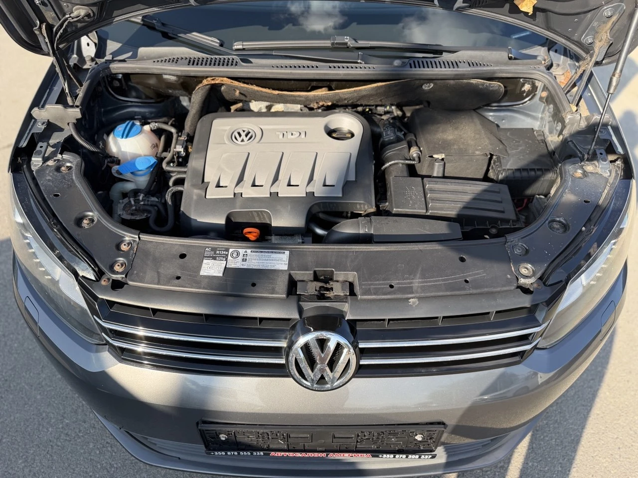 VW Touran 1.6TDI NAVI, снимка 17 - Автомобили и джипове - 55849691