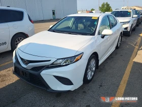 ������ Toyota Camry