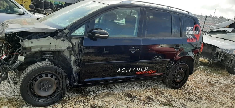 VW Touran 1.6 TDI, снимка 5 - Автомобили и джипове - 38582035