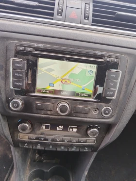 Skoda Rapid 1.6 TDI * NAVI* Подгрев* , снимка 13