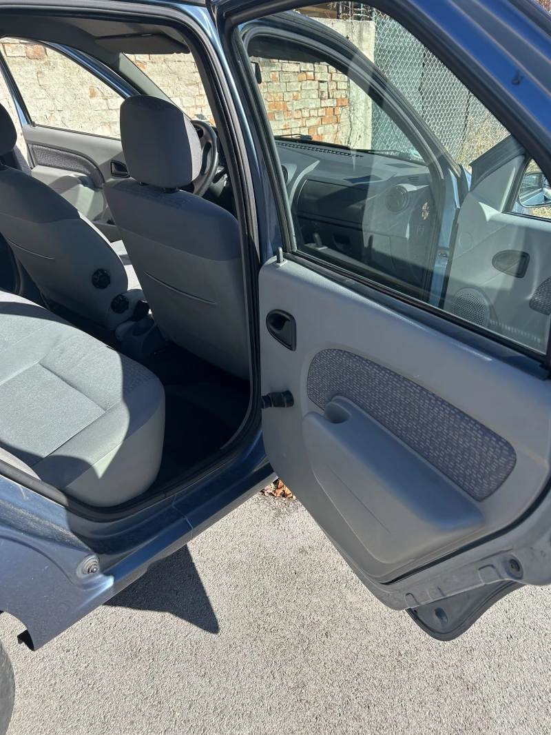 Dacia Logan, снимка 9 - Автомобили и джипове - 52263471
