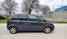 Opel Meriva 1.6i 16 V Swiss Aut., снимка 7