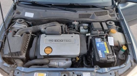 Opel Astra 1.6i 16v клима, снимка 11