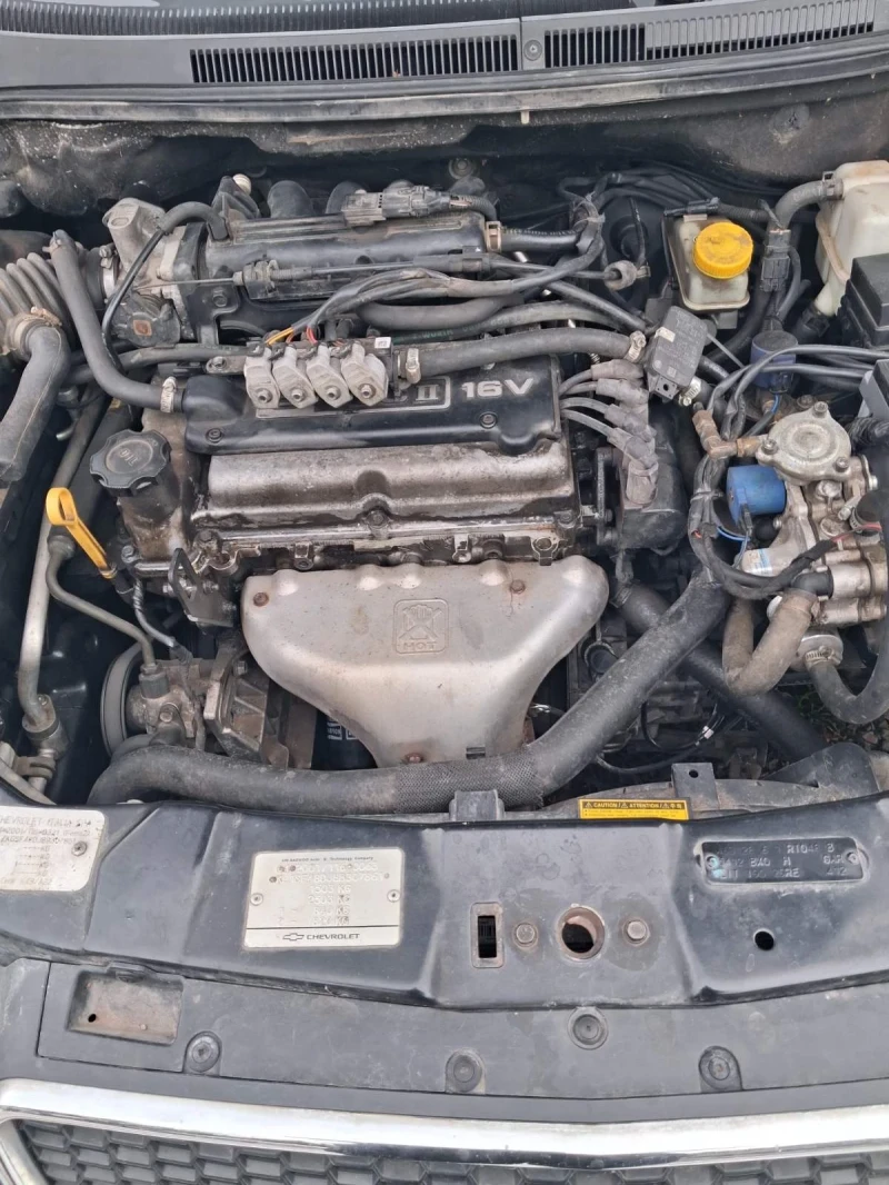 Chevrolet Aveo, снимка 12 - Автомобили и джипове - 53205649