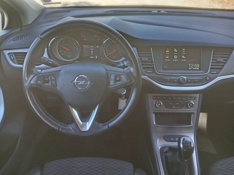 Opel Astra 1.5D SW, снимка 12 - Автомобили и джипове - 51882390