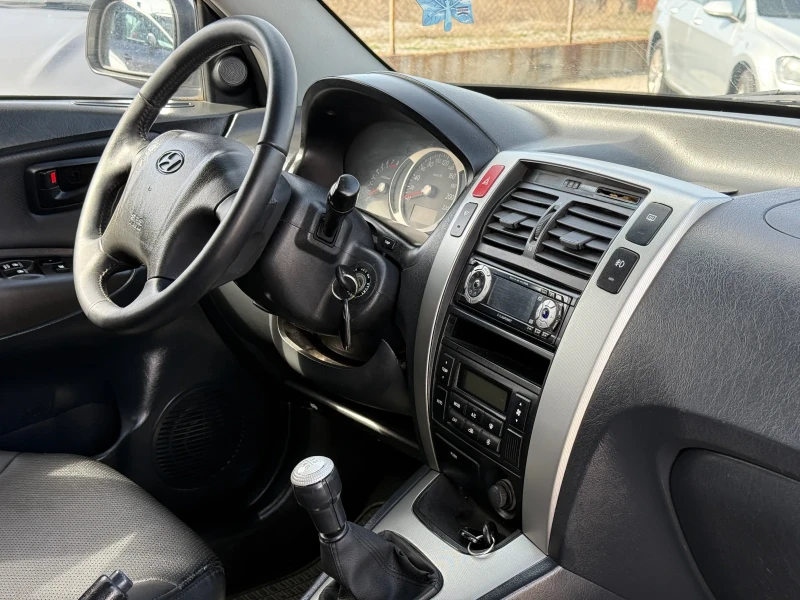 Hyundai Tucson 4X4 Бензин, снимка 13 - Автомобили и джипове - 49496018