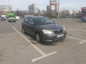 Toyota Corolla Е120, снимка 2