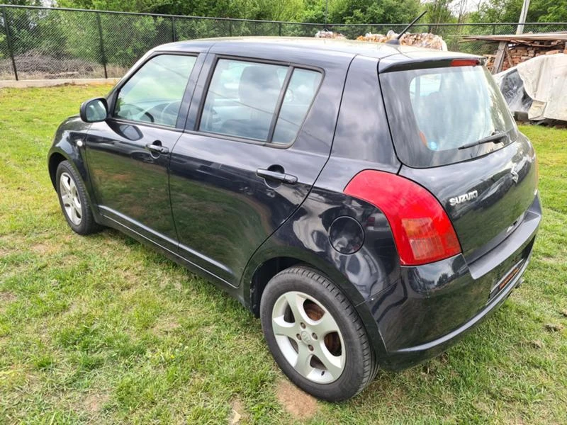 Suzuki Swift 1.3 4x4, снимка 5 - Автомобили и джипове - 47659759