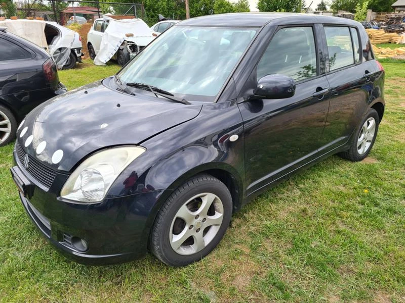 Suzuki Swift 1.3 4x4, снимка 3 - Автомобили и джипове - 47659759