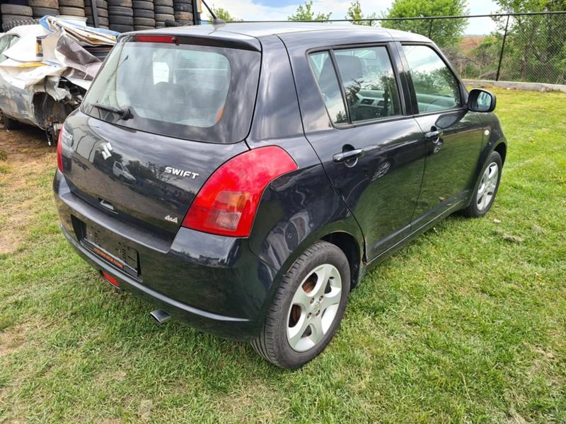 Suzuki Swift 1.3 4x4, снимка 7 - Автомобили и джипове - 47659759