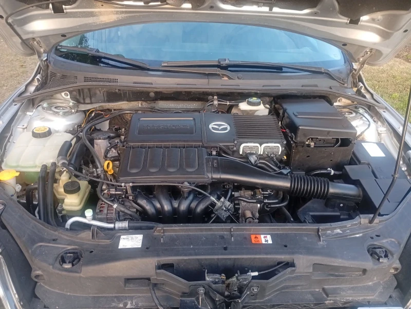 Mazda 3 1.4i Feislif , снимка 14 - Автомобили и джипове - 52147537