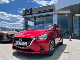 ������ Mazda 2