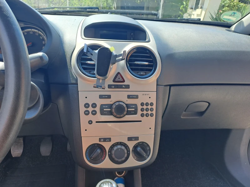 Opel Corsa 1.2, снимка 11 - Автомобили и джипове - 46818595