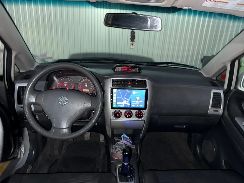 Suzuki Liana, снимка 6 - Автомобили и джипове - 48266498