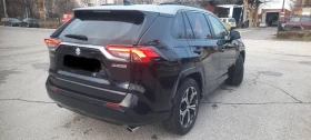 Toyota Rav4 2.5PHEV/306HP/COMFORT+ /4X4/DIGI/NAVI/KLESS/515f - 35200 € / 68845.22 лв. - 84884817 9