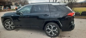 Toyota Rav4 2.5PHEV/306HP/COMFORT+ /4X4/DIGI/NAVI/KLESS/515f - 35200 € / 68845.22 лв. - 84884817 6