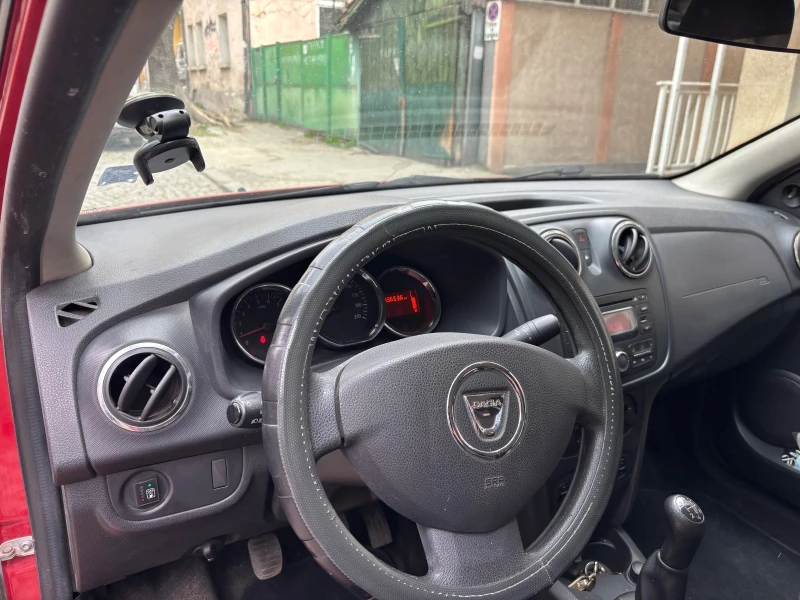 Dacia Logan, снимка 8 - Автомобили и джипове - 49607551