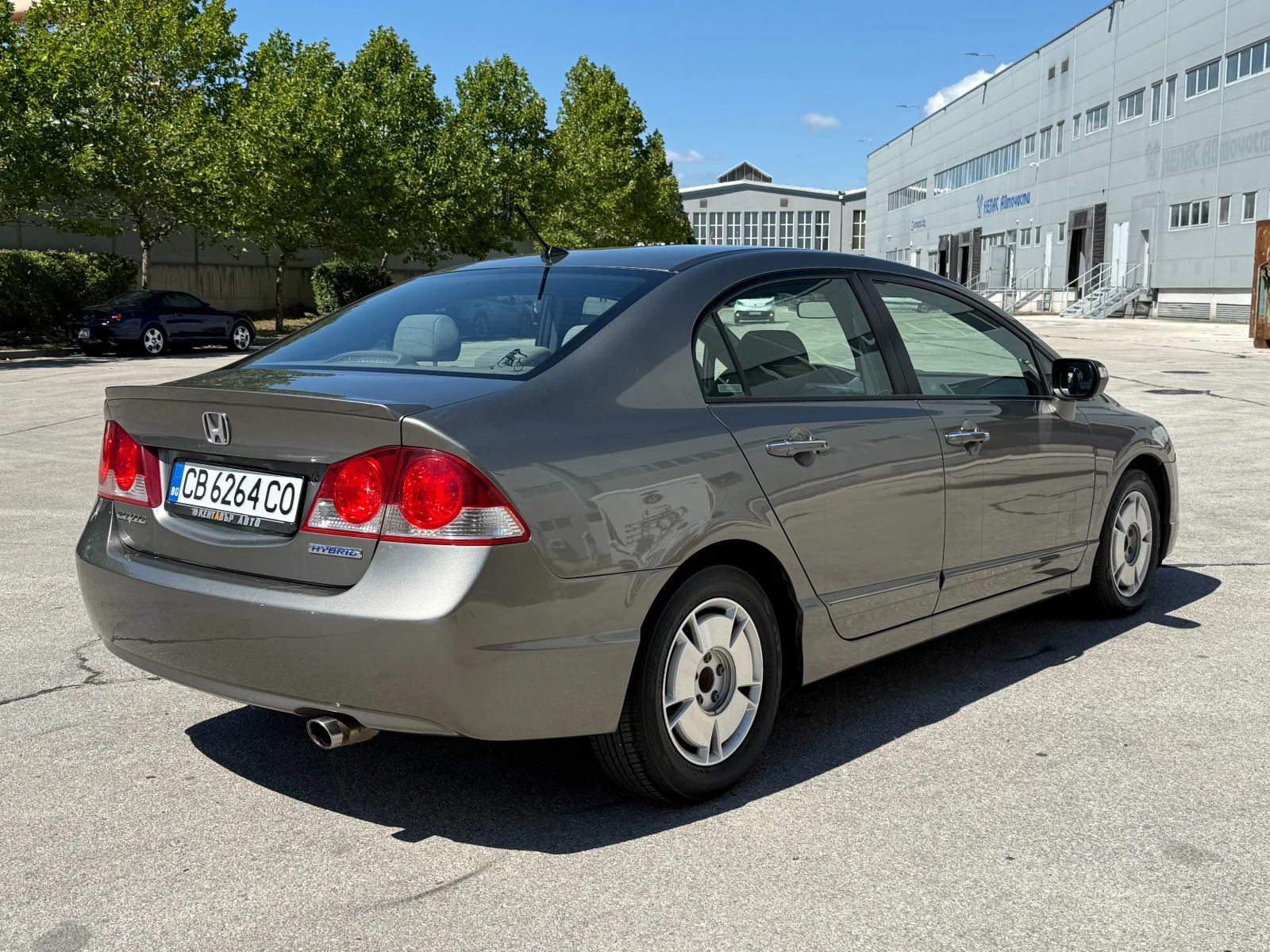 Honda Civic 4 DR Hybrid 95 к.с. - изображение 4