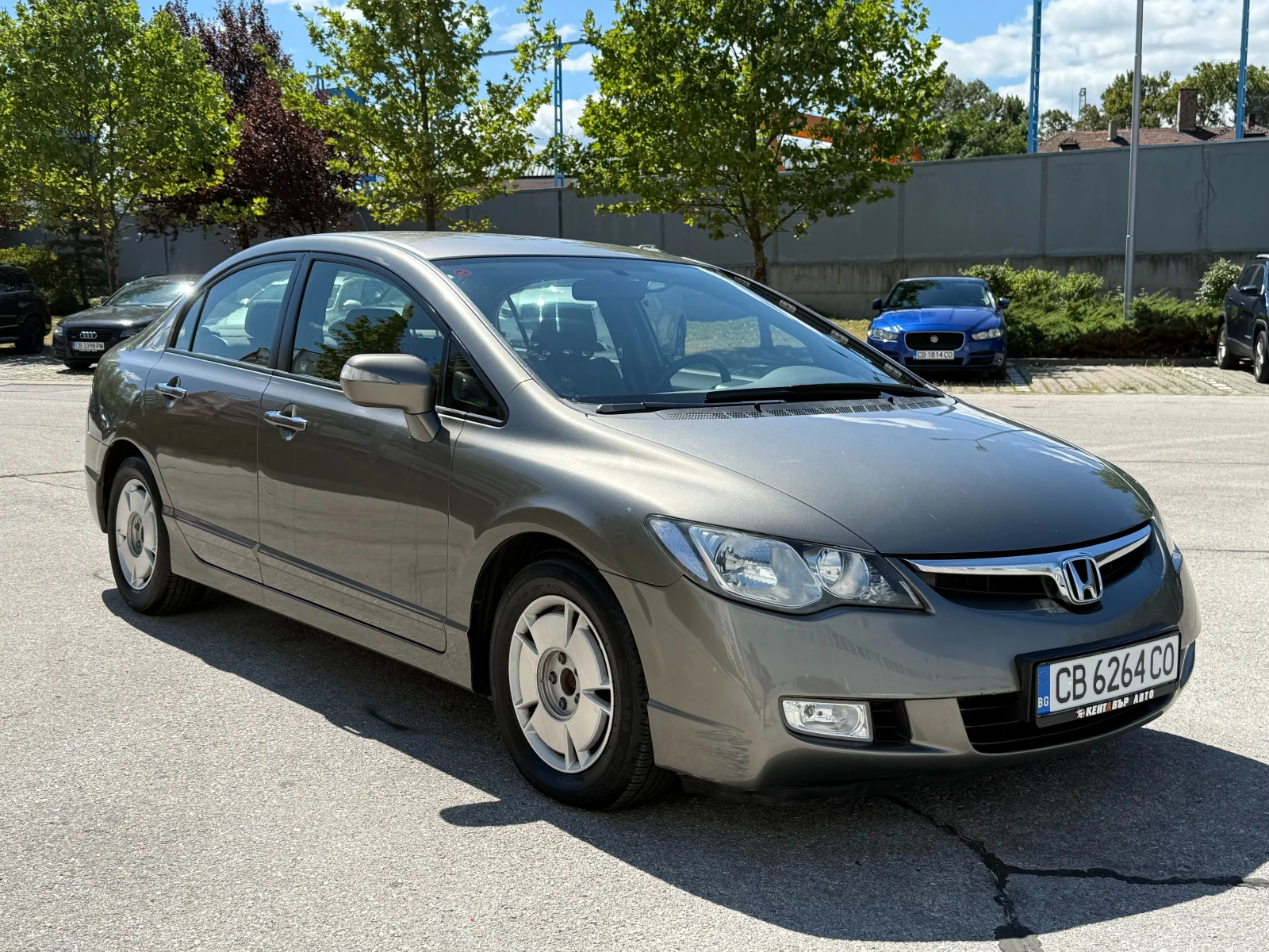 Honda Civic 4 DR Hybrid 95 к.с. - изображение 6