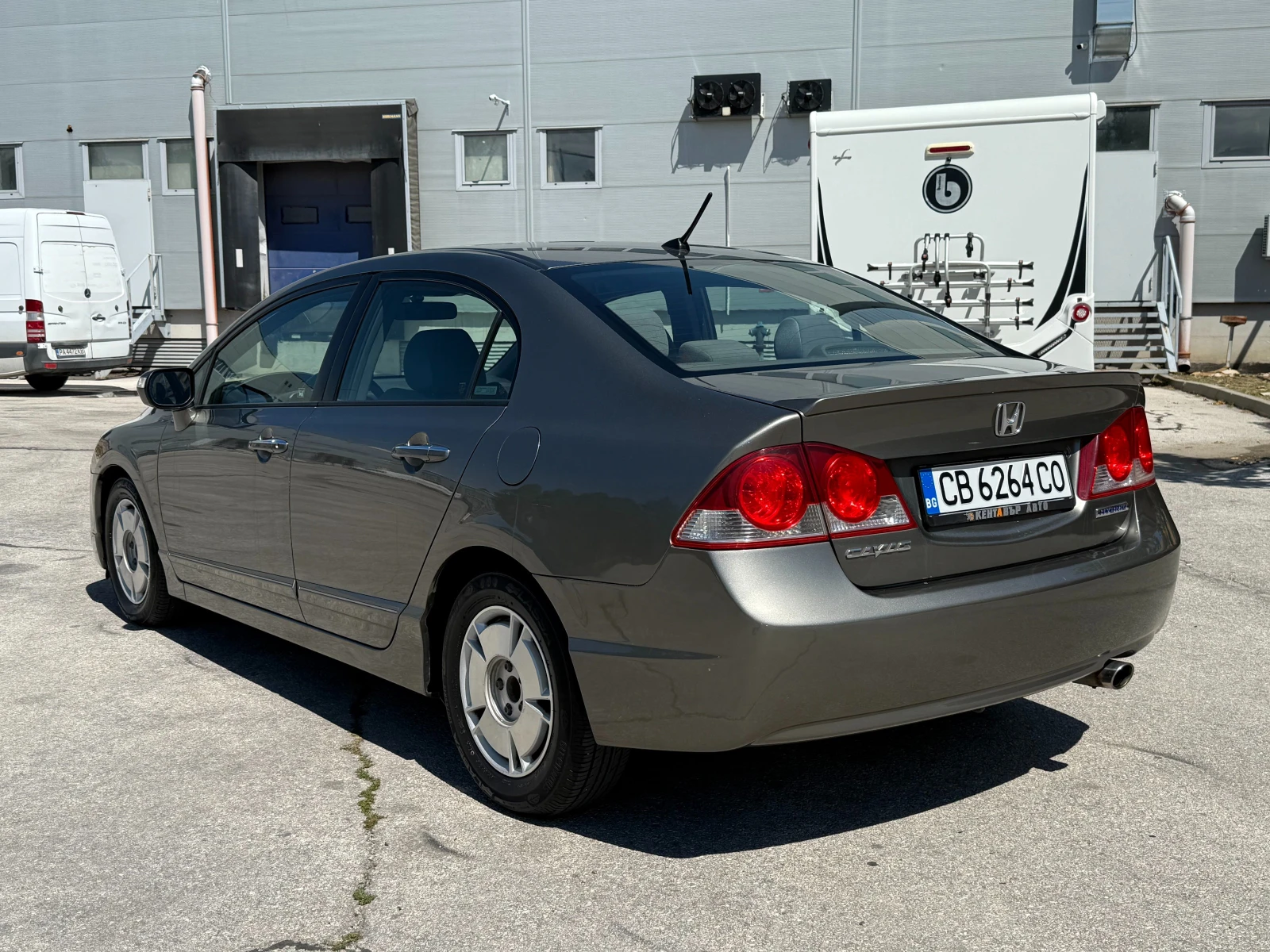 Honda Civic 4 DR Hybrid 95 к.с. - изображение 3