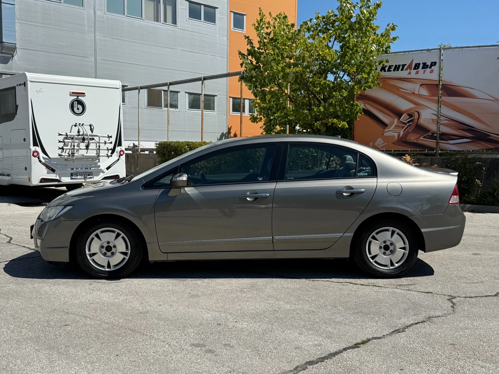 Honda Civic 4 DR Hybrid 95 к.с. - изображение 2