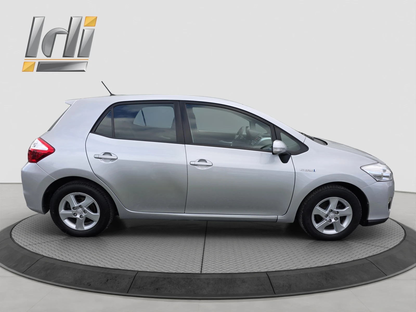 Toyota Auris 1.8 Hybrid 99hp, снимка 7 - Автомобили и джипове - 54817016