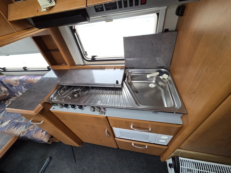 Каравана Hobby 545, снимка 12 - Каравани и кемпери - 53246455