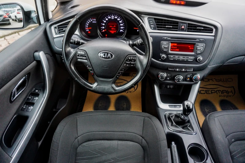Kia Ceed 1.4i SW, снимка 11 - Автомобили и джипове - 51898187