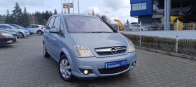 Opel Meriva 1.4--90кс, снимка 1 - Автомобили и джипове - 45387346