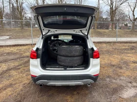 BMW X1 xDrive28i /СARFAX/ГУМИ+ ДЖАНТИ/ПАНО/КЛИП, снимка 11