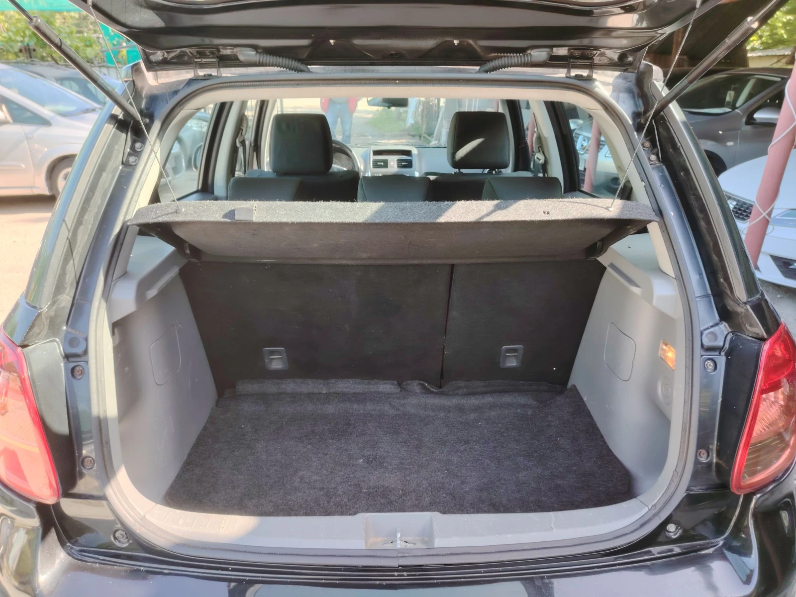 Suzuki SX4 1.6 i 4x4, снимка 8 - Автомобили и джипове - 47416063
