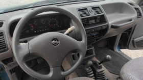 Nissan Terrano 2.4 i, снимка 11 - Автомобили и джипове - 45317423