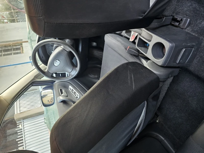 Suzuki Liana, снимка 13 - Автомобили и джипове - 52723573