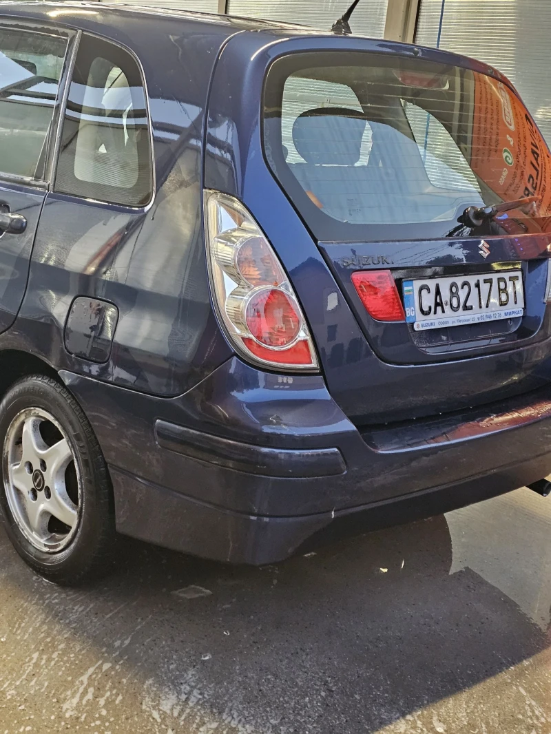 Suzuki Liana, снимка 5 - Автомобили и джипове - 52723573