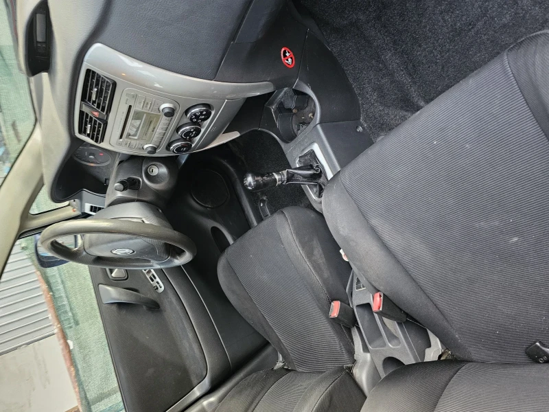 Suzuki Liana, снимка 10 - Автомобили и джипове - 52723573