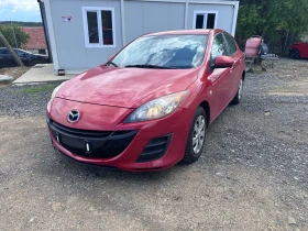 ������ Mazda 3