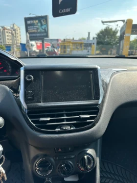 Peugeot 208, снимка 9