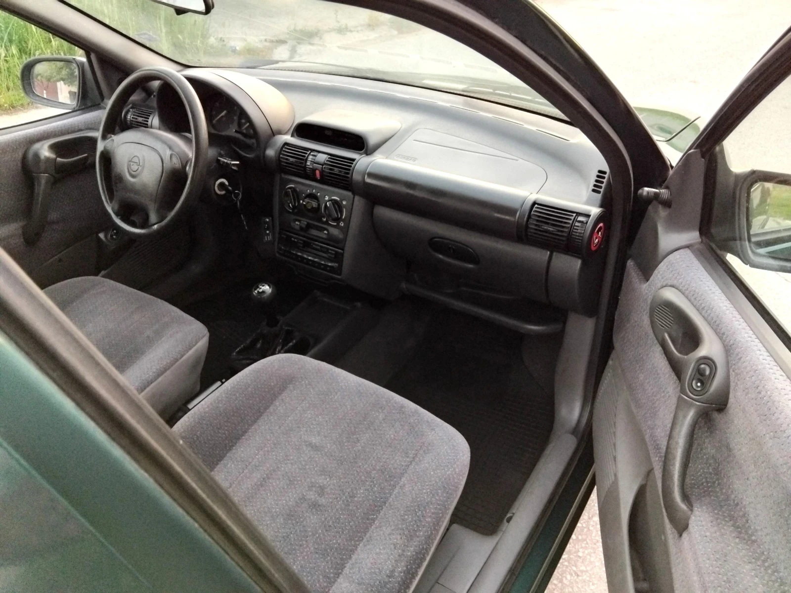 Opel Corsa 1.4.МОНО.75 + ГАЗ + КЛИМА. ТОП///, снимка 13 - Автомобили и джипове - 54721330