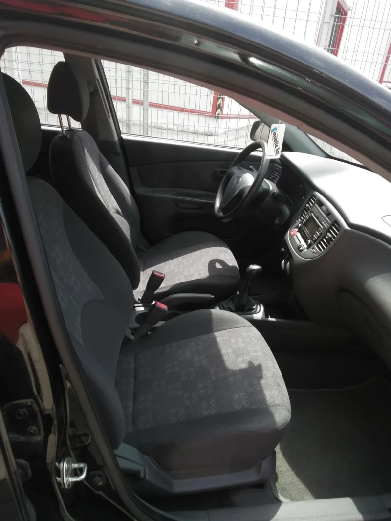 Kia Rio PILOT  1.4, снимка 9 - Автомобили и джипове - 47155242