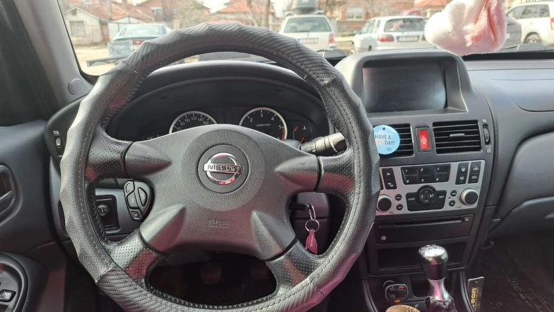 Nissan Almera 1.5dci, снимка 10 - Автомобили и джипове - 48899916