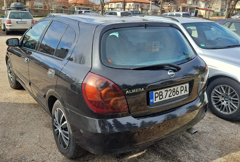 Nissan Almera 1.5dci, снимка 5 - Автомобили и джипове - 48899916