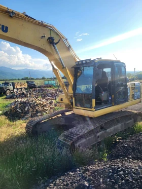 Багер Komatsu HB215LC Hybrid, снимка 1