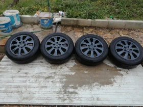 Гуми с джанти Kumho 185/60R15, снимка 1