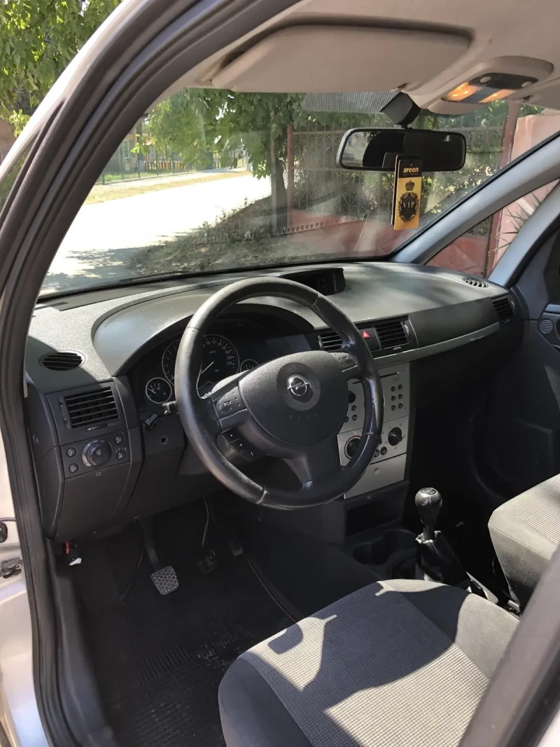 Opel Meriva 1.6i газ бензин, снимка 9 - Автомобили и джипове - 52636343