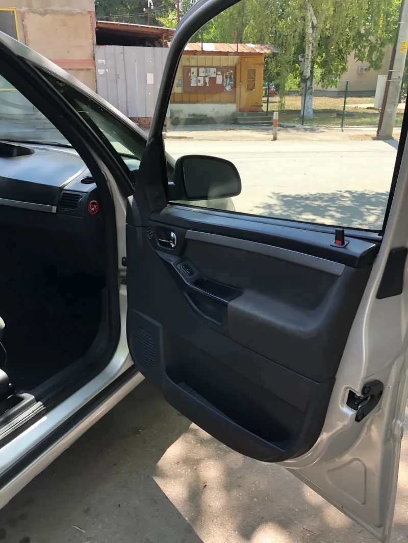 Opel Meriva 1.6i газ бензин, снимка 12 - Автомобили и джипове - 52636343