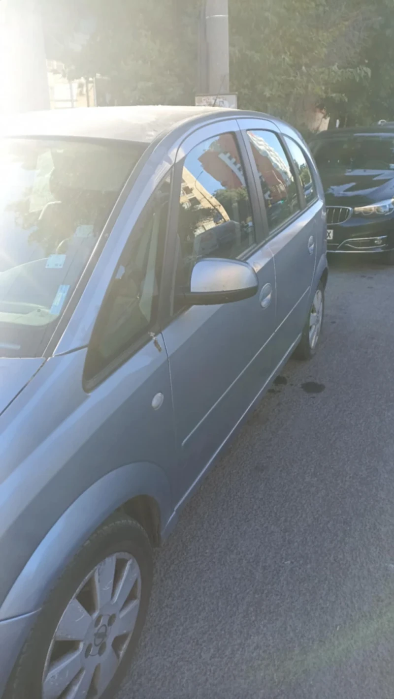 Opel Meriva, снимка 4 - Автомобили и джипове - 52310454