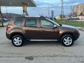 Dacia Duster 1.6i 4x4, снимка 4