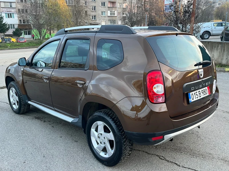 Dacia Duster 1.6i 4x4, снимка 7 - Автомобили и джипове - 52570774
