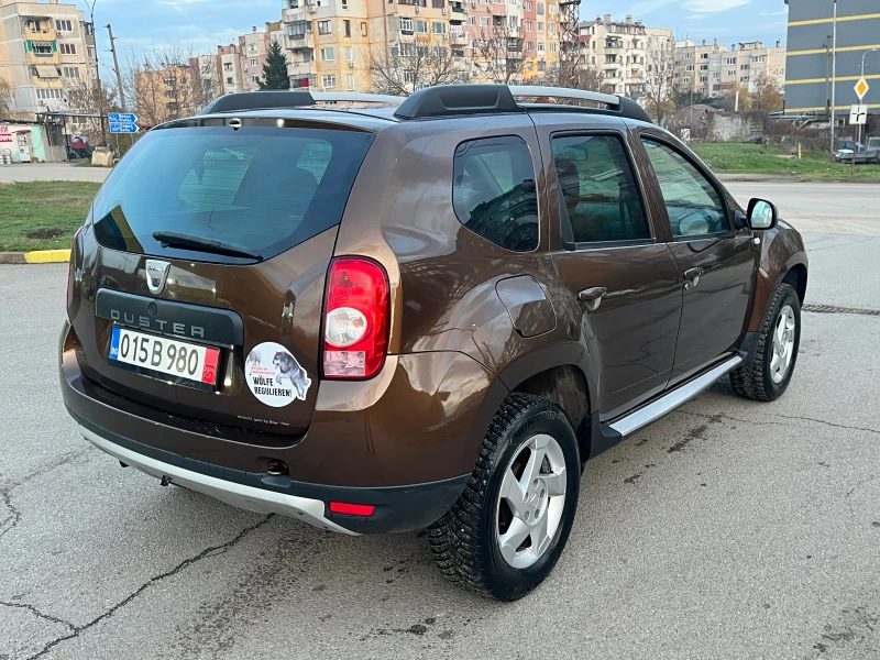 Dacia Duster 1.6i 4x4, снимка 5 - Автомобили и джипове - 52570774
